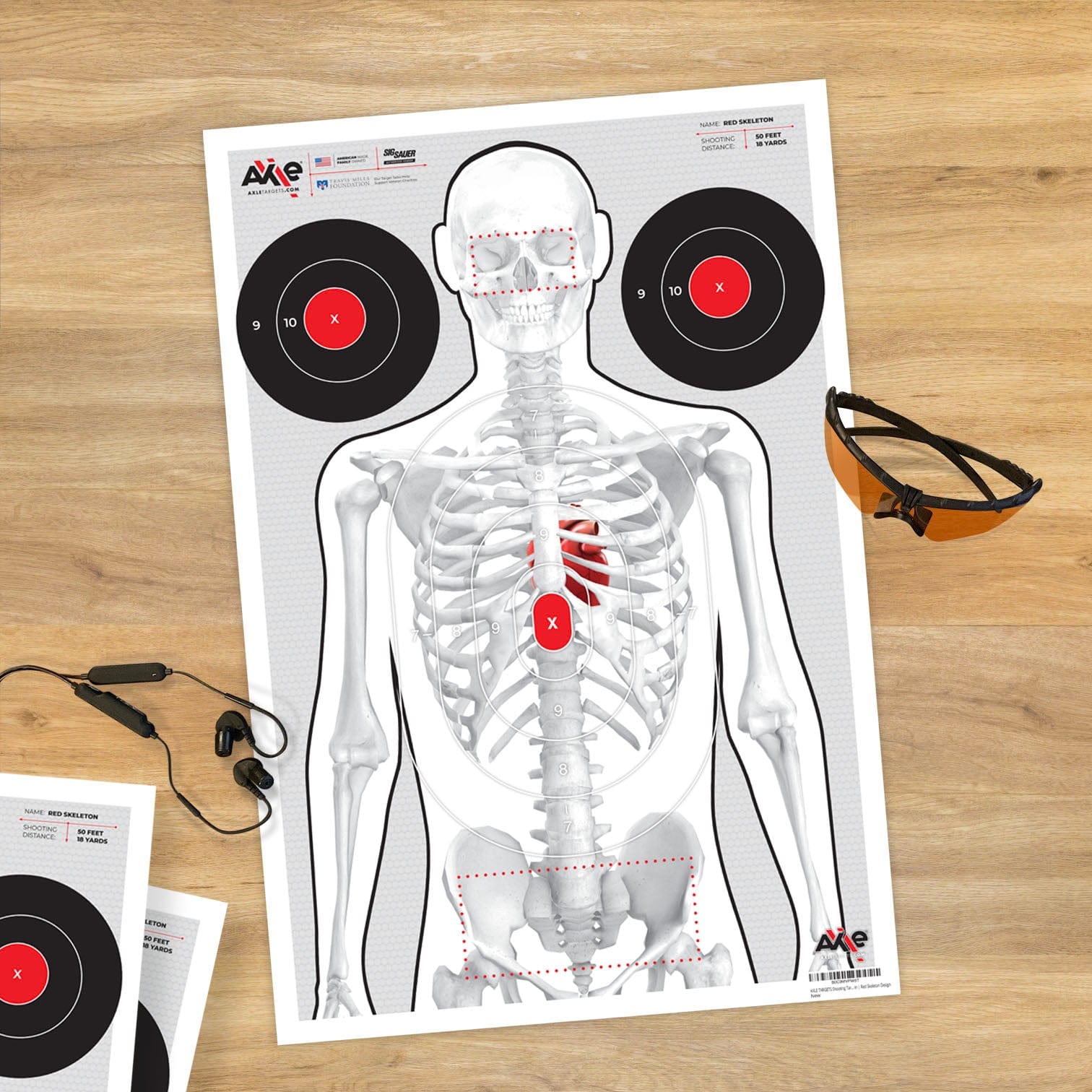 Axle Red skeleton target on wood with safety glasses.