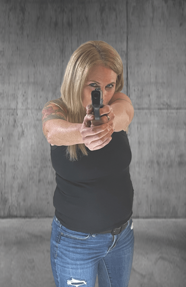 Full-color situational target artwork of an armed female threat pointing a pistol against a gray concrete wall